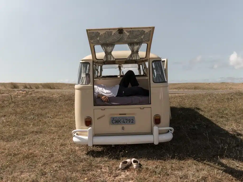 Person Relaxing in Volkswagen Bus