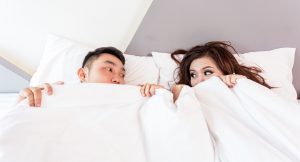 Couple in bed sleep statistics 2021