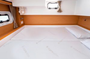 Side by side boat mattress installed in yacht hull cabin
