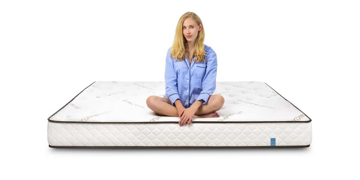 RV Latex Mattress with Model Sitting on Top